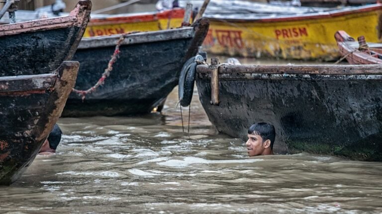 Fishing boats in India representing flood relief for coastal fisherfolk